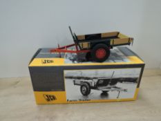 Universal Hobbies 1:16 scale die-cast, JCB Farm Trailer, in original box with internal packaging,