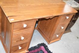 A vintage pine dressing table or desk, width approx. 114cm