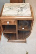 An Art Deco walnut bedside cabinet having marble top