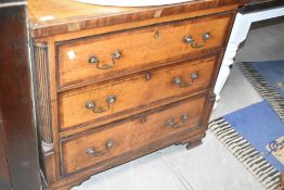 A 19th Century oak chest of nice proportions having mahogany cross banding, corinthian column