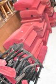 A large selection of vintage cinema seats and frames