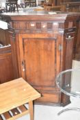 A Georgian mahogany corner cupboard, height approx. 124cm