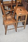 A group of three four legged stools, the largest 65cm