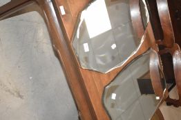 Two vintage frameless wall mirrors