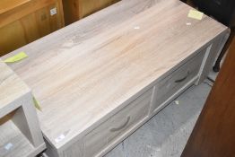 A modern laminate TV cabinet or coffee table, dimensions approx. W110 H43 D55cm
