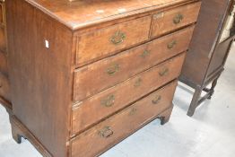 A Georgian golden oak chest of two over three drawers, on bracket feet, width approx. 93cm
