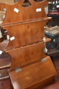 A vintage mahogany display rack, currently used for spoons (included) possibly originally for