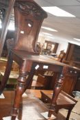 A Victorian mahogany hall chair of traditional design, seat height 41cm