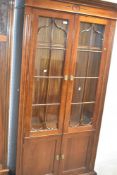 A reproduction mahogany bookcase, dimensions approx. H190 W100 D30cm