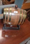 A small oak decorative sherry cask/barrel on stand, overall height approx. 33cm