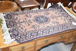 A vintage Persian/Sarouk style rug, approx 106 x 65cm