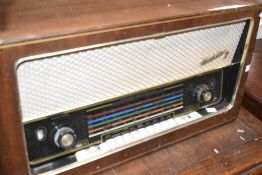 A vintage Madeira wireless radio, width approx. 64cm