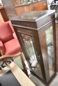 A modern laminate display cabinet, 123cm x 45cm x 29.5cm