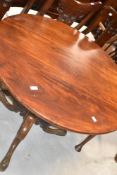 A 19th Century mahogany pedestal table having circular top, turned column and triple splay legs,