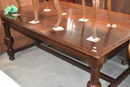 A traditional oak refectory style dining table having bulbous leg, approx. 182 x 121cm