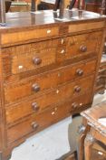 A 19th Century oak secretaire chest having secret drawers and fitted interior, width approx. 124cm