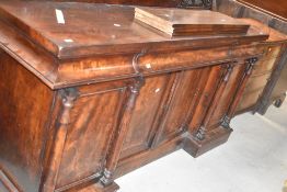 A Victorian mahogany sideboard, having concealed frieze drawer and quadruple cupboards under width