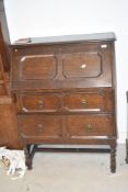 An early 20th Century Jacobean style bureau on twist legs