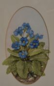 An attractive oval botanical watercolour, a depiction of primroses, indistinctly signed Hazel T