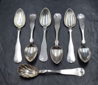A group of seven American white metal Hanoverian style pattern spoons presumed to be silver, all
