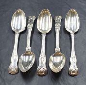 A group of three early 19th century silver King's pattern spoons, two having monograms to the