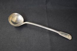 A William IV silver fiddle pattern ladle, having thread and shell decoration, marks for London 1835,