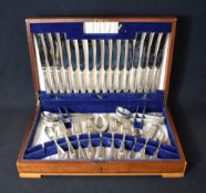An Elizabeth II canteen of silver flatware and cutlery, containing an eight piece silver setting