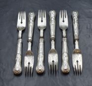 A set of six Victorian silver King's pattern forks, having decorative engraving to the heads,