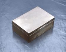 A George V silver cigarette box, of hinged rectangular form having 'CES' initials to the lid,