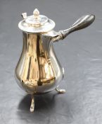 An Edwardian silver coffee pot, of bulbous form having an acorn finial over egg and dart rim and