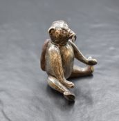 An Edwardian silver novelty pin cushion, modelled as an articulated 'bait bear', having paste set
