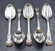 A set of four late William IV silver Queen's pattern serving spoons, having engraved initials to