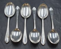 A set of six Elizabeth II silver Sandringham pattern dessert spoons, marks for Sheffield 1957, maker