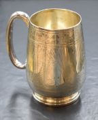 A Victorian silver tankard, of slightly bulbous form having decorative engraving and central