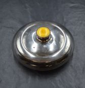 An Edwardian silver and guilloche enamel mounted glass vanity powder jar, of flattened circular form