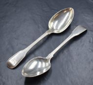 A pair of George III silver fiddle and thread pattern spoons, having heraldic crests to the