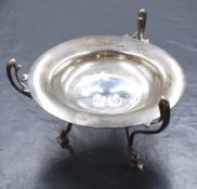 An Edwardian silver Art Nouveau pedestal dish, of circular form having a wide flared rim with raised