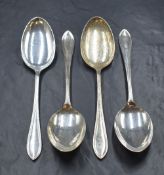 A set of four Elizabeth II silver Sandringham pattern serving spoons, marks for Sheffield 1956,