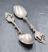 A pair of Dutch import 19th/20th century silver commemorative spoons, having ornate pierced