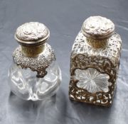 A Victorian silver mounted cut glass scent bottle, of square form having an embossed classical scene