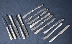 A set of six George V silver handled knives, having decorative thread to the handle, marks for