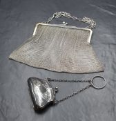 A George V silver coin purse, having decorative scroll engraving and a central vacant cartouche,