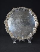 An Elizabeth II silver salver, of circular form having a Chippendale scroll rim with personalised
