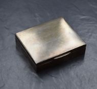 An Elizabeth II silver cigarette case, of hinged rectangular form having engine turned decoration to