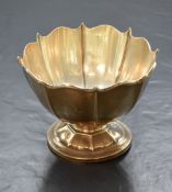 A Edwardian silver pedestal bowl, having lobed rim and sides, raised on a circular moulded foot,