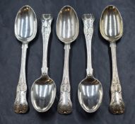 A group of five Victorian silver King's pattern teaspoons, having heraldic crests to terminals,