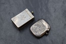 A Victorian silver cased cigarette box, of plain rectangular form having an engraved monogram to one