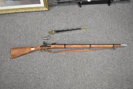 London Armoury, non-firing percussion-cap musket rifle with working mechanism, engraved to the