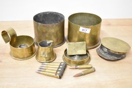 WW1 Trench Art brass shell case bases and items, two British bases dated 1917 and 1918, a clip of .