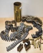 76MM ARMDC RW175 brass shell casing dated 1963, further stamped with crowsfoot and LOT18 RLB. Sold